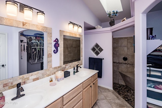 2641 Palo Verde Blvd N, Lake Havasu City, AZ 86404 - bathroom with double vanity, walk in shower, a walk in closet, and a sink