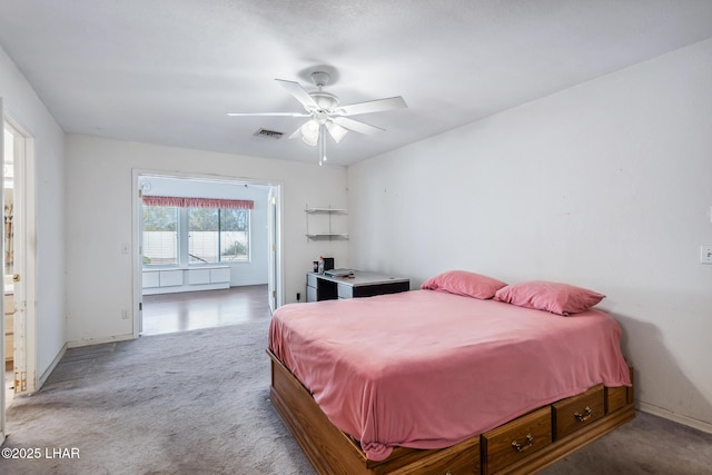 2974 Caravelle Dr, Lake Havasu City, AZ 86406 - bedroom featuring light carpet, ceiling fan, and baseboards