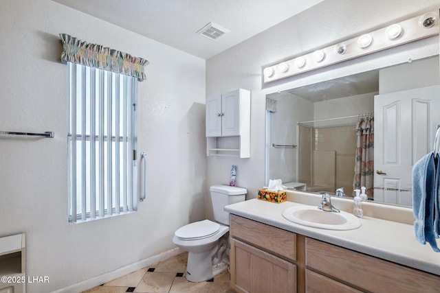 2974 Caravelle Dr, Lake Havasu City, AZ 86406 - full bath featuring a shower with curtain, toilet, tile patterned flooring, vanity, and baseboards