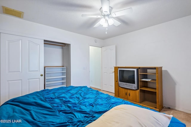 2974 Caravelle Dr, Lake Havasu City, AZ 86406 - carpeted bedroom with a closet, baseboards, and a ceiling fan