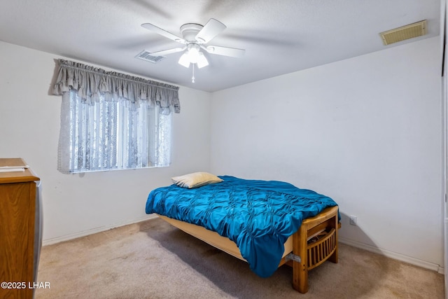 2974 Caravelle Dr, Lake Havasu City, AZ 86406 - carpeted bedroom featuring baseboards and ceiling fan