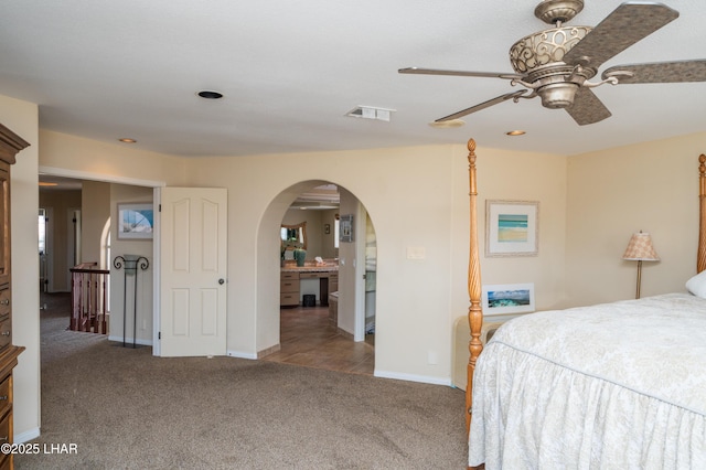 1351 London Bridge Rd Unit 2, Lake Havasu City, AZ 86404 - carpeted bedroom featuring ceiling fan, visible vents, arched walkways, baseboards, and recessed lighting