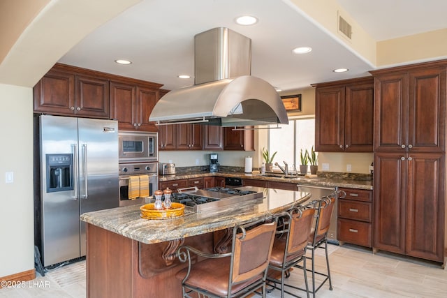 1351 London Bridge Rd Unit 2, Lake Havasu City, AZ 86404 - kitchen featuring a wealth of natural light, a ceiling fan, stainless steel appliances, and island range hood