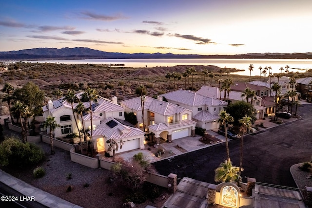 1351 London Bridge Rd Unit 2, Lake Havasu City, AZ 86404 - aerial view at dusk with a residential view and a water and mountain view