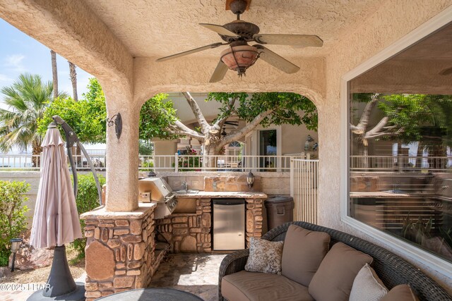 1351 London Bridge Rd Unit 2, Lake Havasu City, AZ 86404 - view of patio / terrace featuring ceiling fan, fence, area for grilling, and an outdoor kitchen