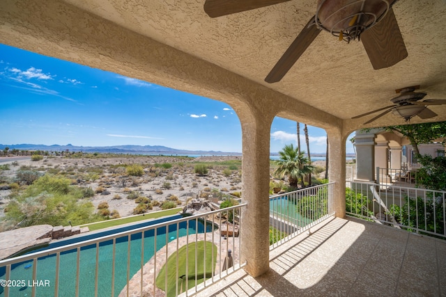 1351 London Bridge Rd Unit 2, Lake Havasu City, AZ 86404 - balcony featuring ceiling fan and a mountain view
