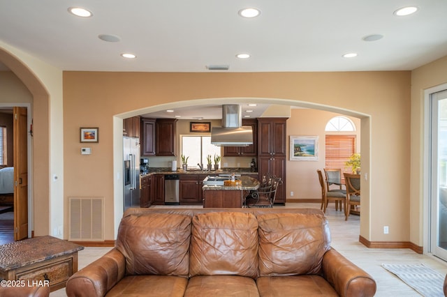 1351 London Bridge Rd Unit 2, Lake Havasu City, AZ 86404 - living room with recessed lighting, arched walkways, and visible vents