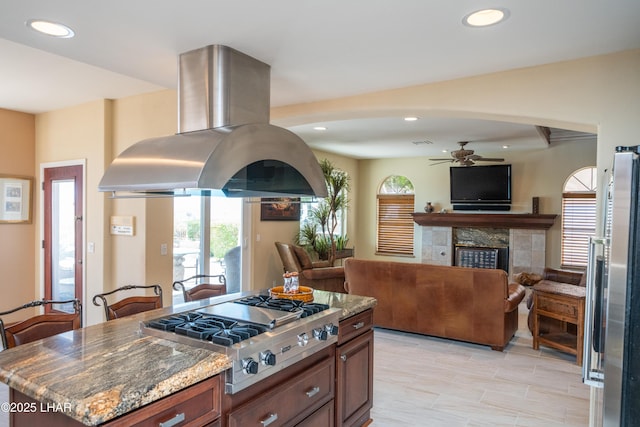 1351 London Bridge Rd Unit 2, Lake Havasu City, AZ 86404 - kitchen featuring a wealth of natural light, a ceiling fan, stainless steel appliances, and island range hood
