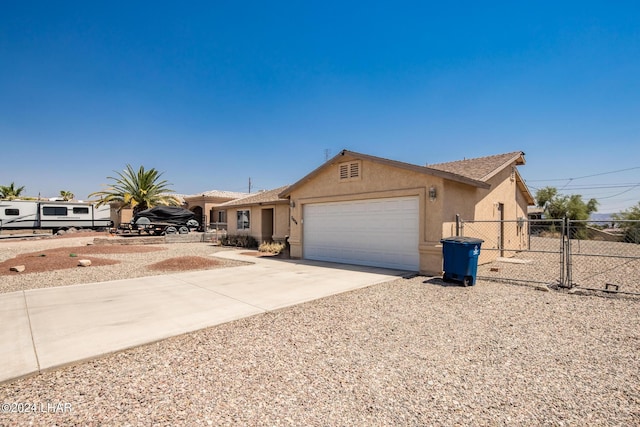 single story home with a garage