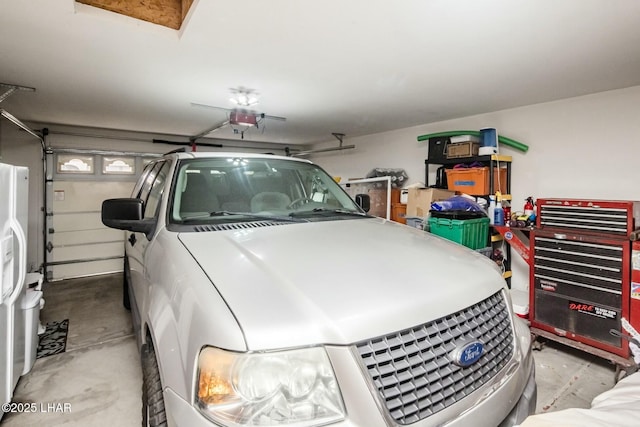 garage featuring a garage door opener