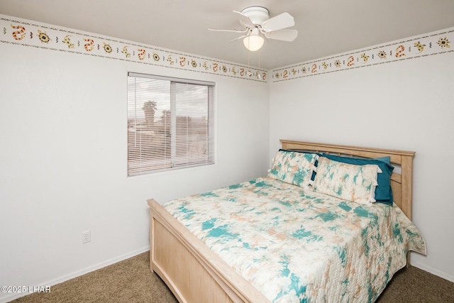 bedroom featuring carpet flooring, a ceiling fan, and baseboards