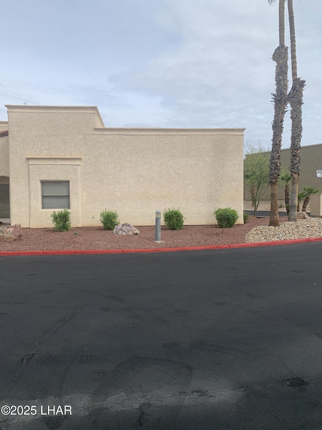 1008 Barcelona Unit 1, Lake Havasu City, AZ 86403 - view of side of property with stucco siding