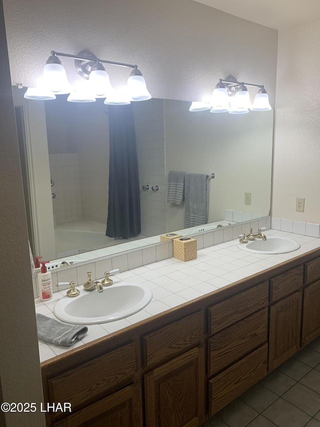1008 Barcelona Unit 1, Lake Havasu City, AZ 86403 - bathroom featuring a sink, tile patterned flooring, and double vanity