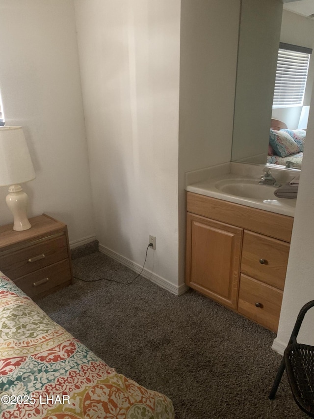 1008 Barcelona Unit 1, Lake Havasu City, AZ 86403 - bedroom featuring carpet, baseboards, and a sink