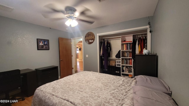 bedroom with a closet and ceiling fan