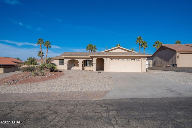 single story home featuring a garage