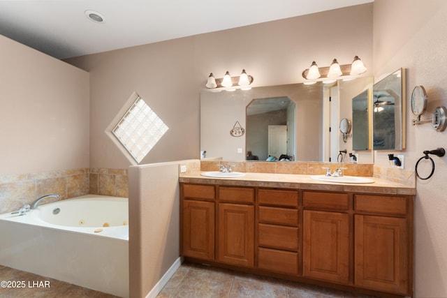 bathroom featuring tile patterned floors, a sink, a whirlpool tub, and double vanity