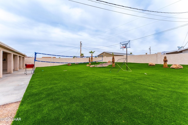 view of yard featuring volleyball court