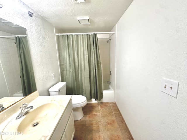 2085 Mesquite Ave Unit 61, Lake Havasu City, AZ 86403 - bathroom with a textured wall, vanity, toilet, shower / bathtub combination with curtain, and a textured ceiling