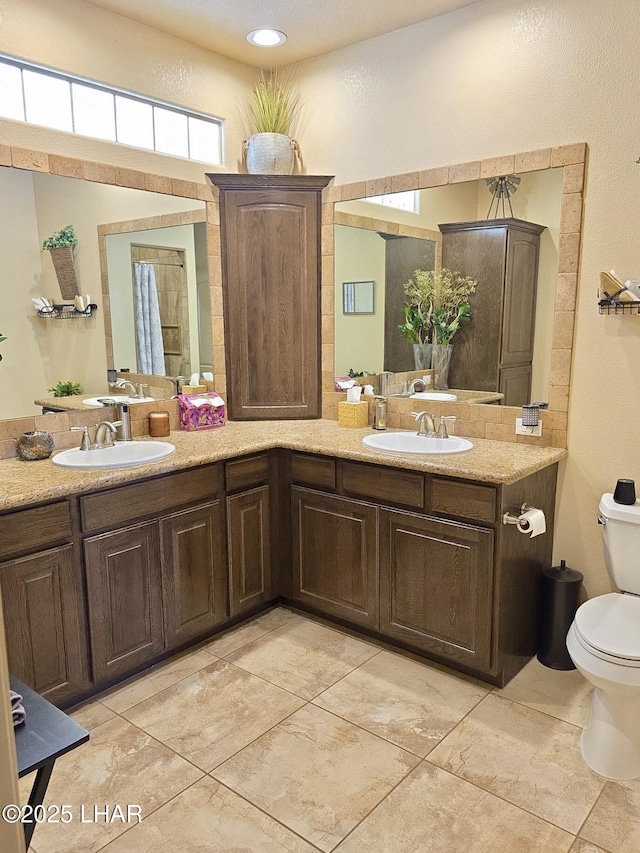2550 E Nez Perce Rd, Fort Mohave, AZ 86426 - bathroom with toilet and double vanity