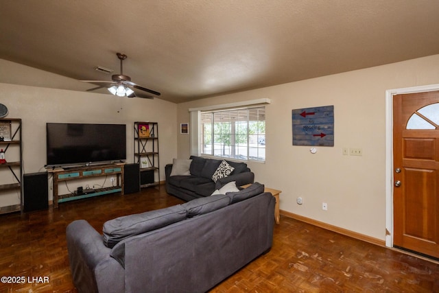 2613 Packet Ln, Lake Havasu City, AZ 86403 - living room with baseboards, a ceiling fan, and lofted ceiling