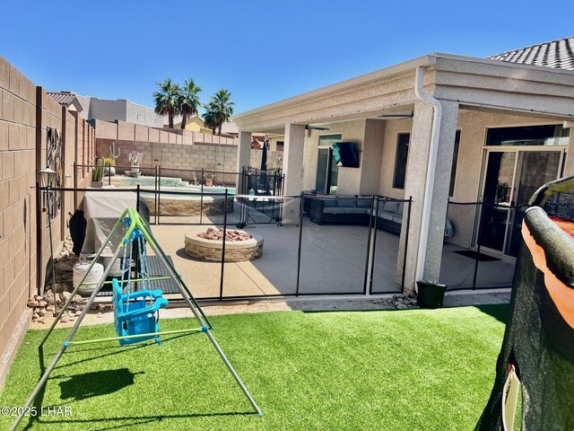 1737 E Alder Cir, Lake Havasu City, AZ 86404 - view of yard with a patio area and a fire pit