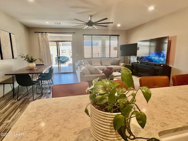 1737 E Alder Cir, Lake Havasu City, AZ 86404 - living room featuring a ceiling fan, healthy amount of natural light, recessed lighting, wood finished floors, and baseboards