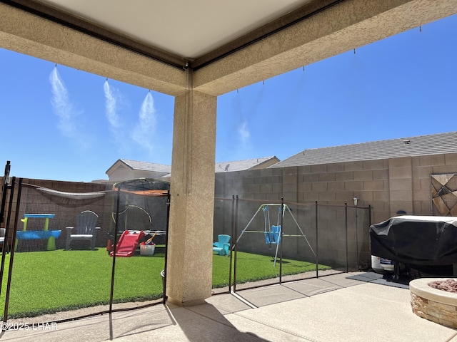 1737 E Alder Cir, Lake Havasu City, AZ 86404 - view of patio featuring an outdoor fire pit and a grill