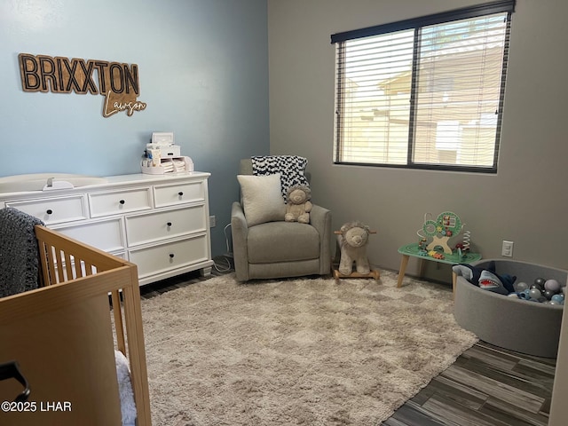 1737 E Alder Cir, Lake Havasu City, AZ 86404 - bedroom with a crib and wood finished floors
