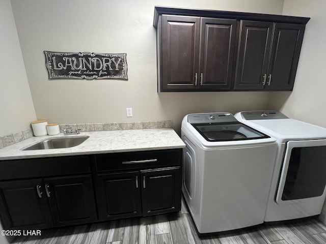 1737 E Alder Cir, Lake Havasu City, AZ 86404 - laundry area with cabinet space, separate washer and dryer, and wood finished floors