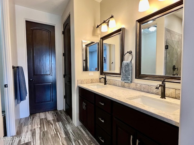1737 E Alder Cir, Lake Havasu City, AZ 86404 - full bathroom featuring double vanity and a shower with door