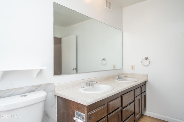 2340 Jamaica Blvd S, Lake Havasu City, AZ 86406 - bathroom featuring double vanity and toilet