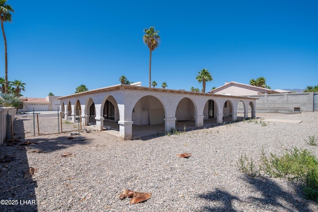 2340 Jamaica Blvd S, Lake Havasu City, AZ 86406 - rear view of property featuring stucco siding and a gate
