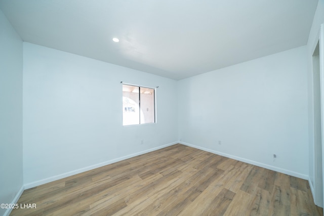 2340 Jamaica Blvd S, Lake Havasu City, AZ 86406 - empty room featuring wood finished floors, baseboards, and recessed lighting