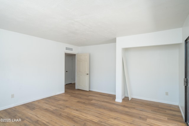 2340 Jamaica Blvd S, Lake Havasu City, AZ 86406 - empty room featuring wood finished floors and baseboards
