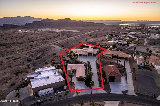 aerial view at dusk with a mountain view