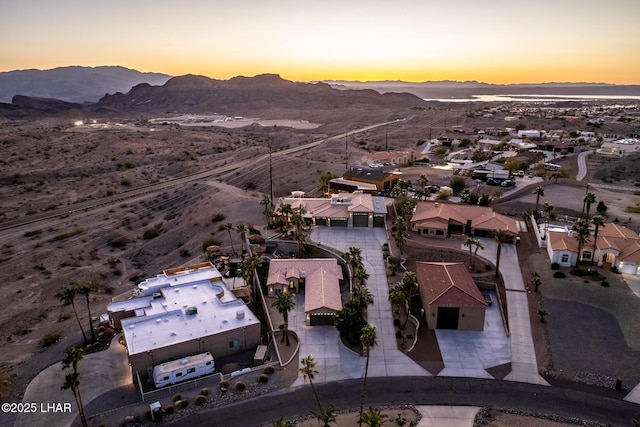 aerial view at dusk with a mountain view