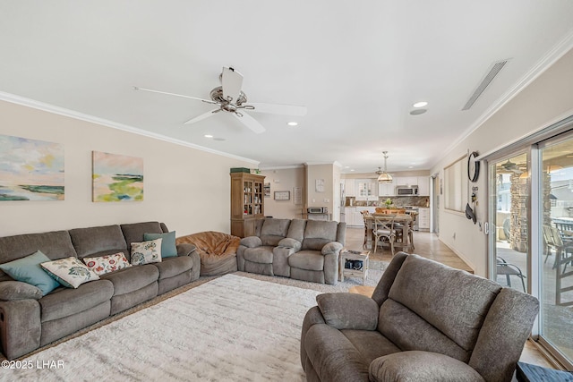 8874 Papago Loop, Parker, AZ 85344 - living room with ceiling fan, healthy amount of natural light, recessed lighting, and ornamental molding