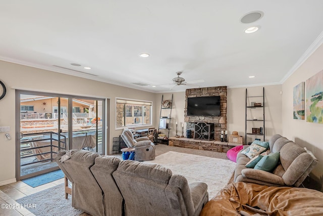 8874 Papago Loop, Parker, AZ 85344 - living room featuring a ceiling fan, ornamental molding, a fireplace, recessed lighting, and light tile patterned flooring