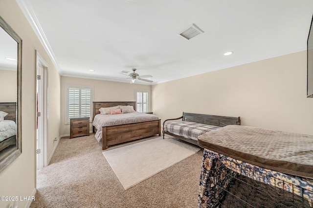 8874 Papago Loop, Parker, AZ 85344 - bedroom with crown molding, light colored carpet, a ceiling fan, and recessed lighting