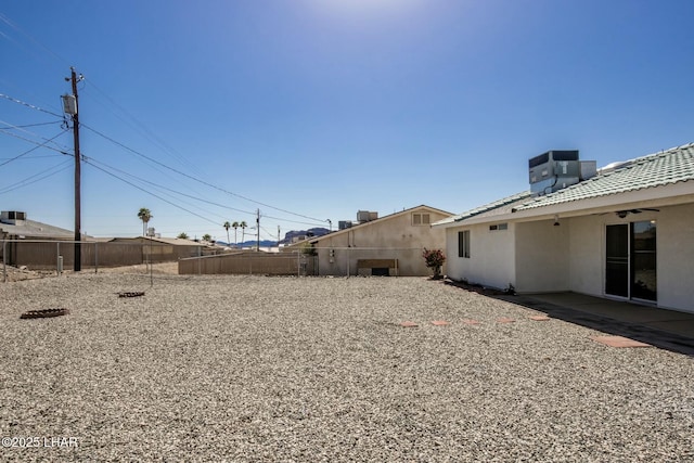 view of yard featuring a patio area, cooling unit, and a fenced backyard