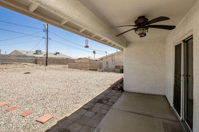 exterior space with a fenced backyard, a patio area, and ceiling fan