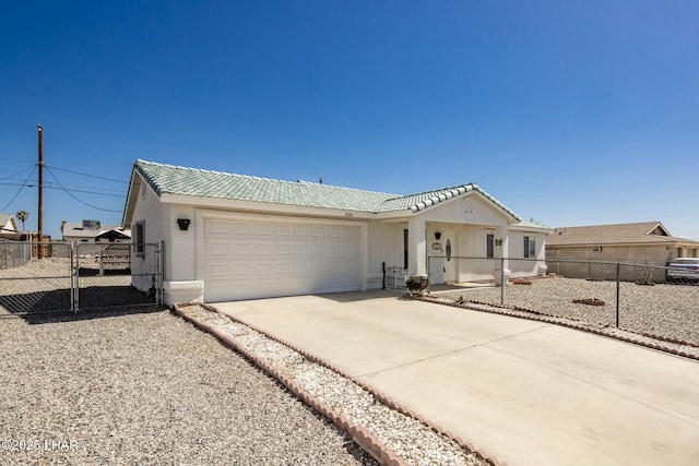 single story home with stucco siding, a tile roof, fence, concrete driveway, and a garage