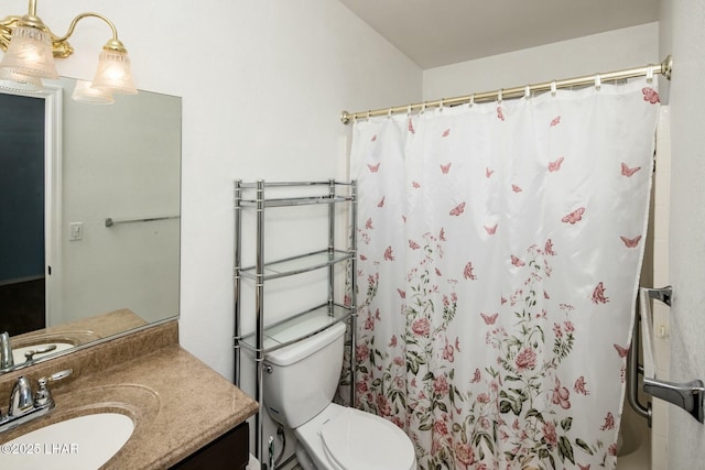 full bath featuring vanity, curtained shower, and toilet