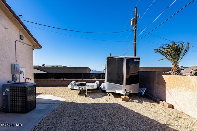 view of yard with central AC