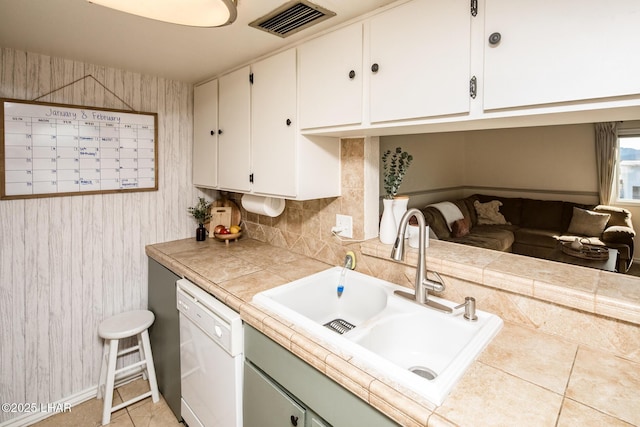 1824 Montana Vis Unit D, Lake Havasu City, AZ 86403 - kitchen featuring a sink, tile countertops, visible vents, white cabinetry, and white dishwasher