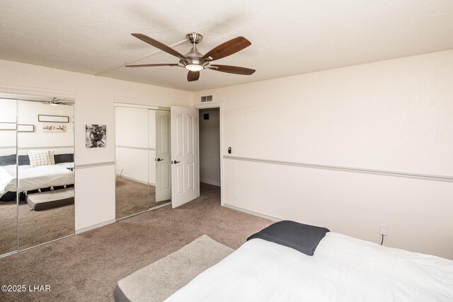 1824 Montana Vis Unit D, Lake Havasu City, AZ 86403 - carpeted bedroom with multiple closets, baseboards, ceiling fan, and visible vents