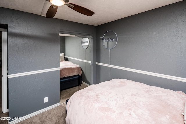 1824 Montana Vis Unit D, Lake Havasu City, AZ 86403 - carpeted bedroom featuring a closet, baseboards, a ceiling fan, and a textured wall