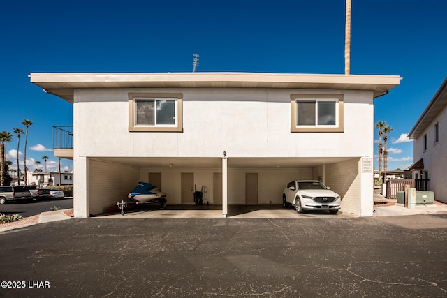 1824 Montana Vis Unit D, Lake Havasu City, AZ 86403 - rear view of house featuring a carport