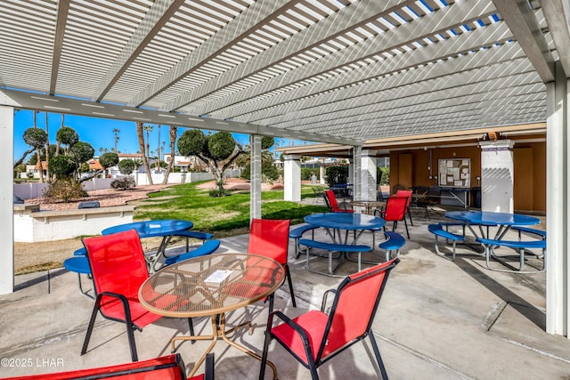 1824 Montana Vis Unit D, Lake Havasu City, AZ 86403 - view of patio / terrace featuring a pergola, outdoor dining area, and fence